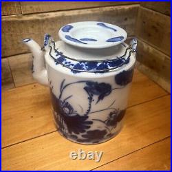 Antique Chinese Qing Dynasty blue and white floral pattern double-eared teapot