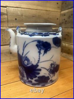 Antique Chinese Qing Dynasty blue and white floral pattern double-eared teapot