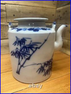 Antique Chinese Qing Dynasty blue and white floral pattern double-eared teapot