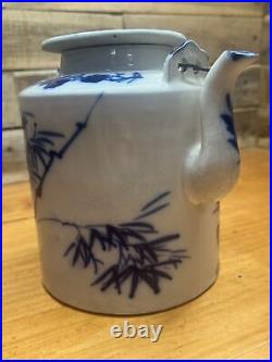 Antique Chinese Qing Dynasty blue and white floral pattern double-eared teapot